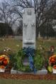 Statue of Mary (Queen of Heaven, Our Lady of the Angels) watches over the 25 child victims in Section 18 of Queen of Heaven Cemetery.