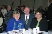 Mary Kay Raymond-Masco ('63), Tom Raymond ('60) and Tom's wife Mary Ann