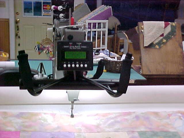 FOLA Quilt 28 (12/10/04) - Angel quilt on long arm quilting machine (Photo Courtesty of Chris Anderson)