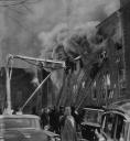 Ladders dot the wall of the school in the alley on the north side. The short ladders were placed mostly by neighbors and family members in vain attempts to rescue children from room 208, 210 and 212. By the time firemen arrived (with longer ladders), they had only minutes to attempt rescues before the classrooms were engulfed in flame.