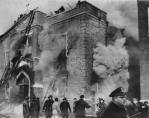 Firemen don't yet realize the number of children still trapped inside the fiery inferno. Firemen rescued about 160 children and teachers before the classrooms burst into flames one by one, killing all who remained. (AP Wire Photo)