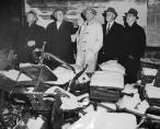 Members of the Coroner's Blue Ribbon Jury visit the site during their investigation of the school fire in the days following the disaster. Fresh snow has fallen into room 211 through a hole in the roof chopped by firemen attempting to vent heat and smoke from the school during the height of the fire.