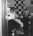 In this photo from 1955, Barbara (Stobierski) Moran (OLA Class of '56), seated farthest away, is sitting at a Hammond organ in the OLA church (the other girl is unidentified). (Photo courtesty of Barbara Moran and Terry Lowe